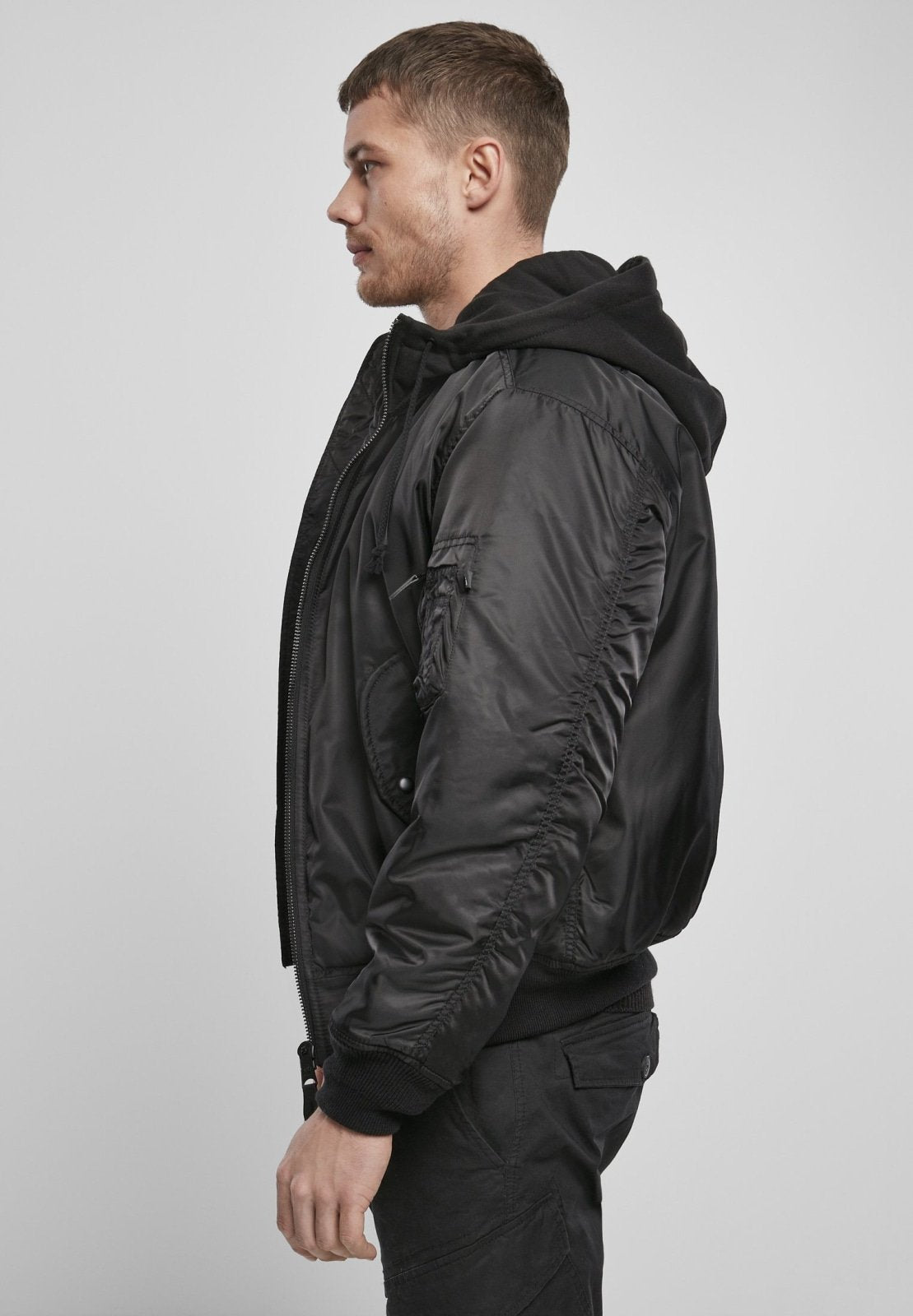 Callisto hooded MA1 bomber jacket with a zip-up front, ribbed cuffs, and a hood, designed for stylish and functional outerwear.