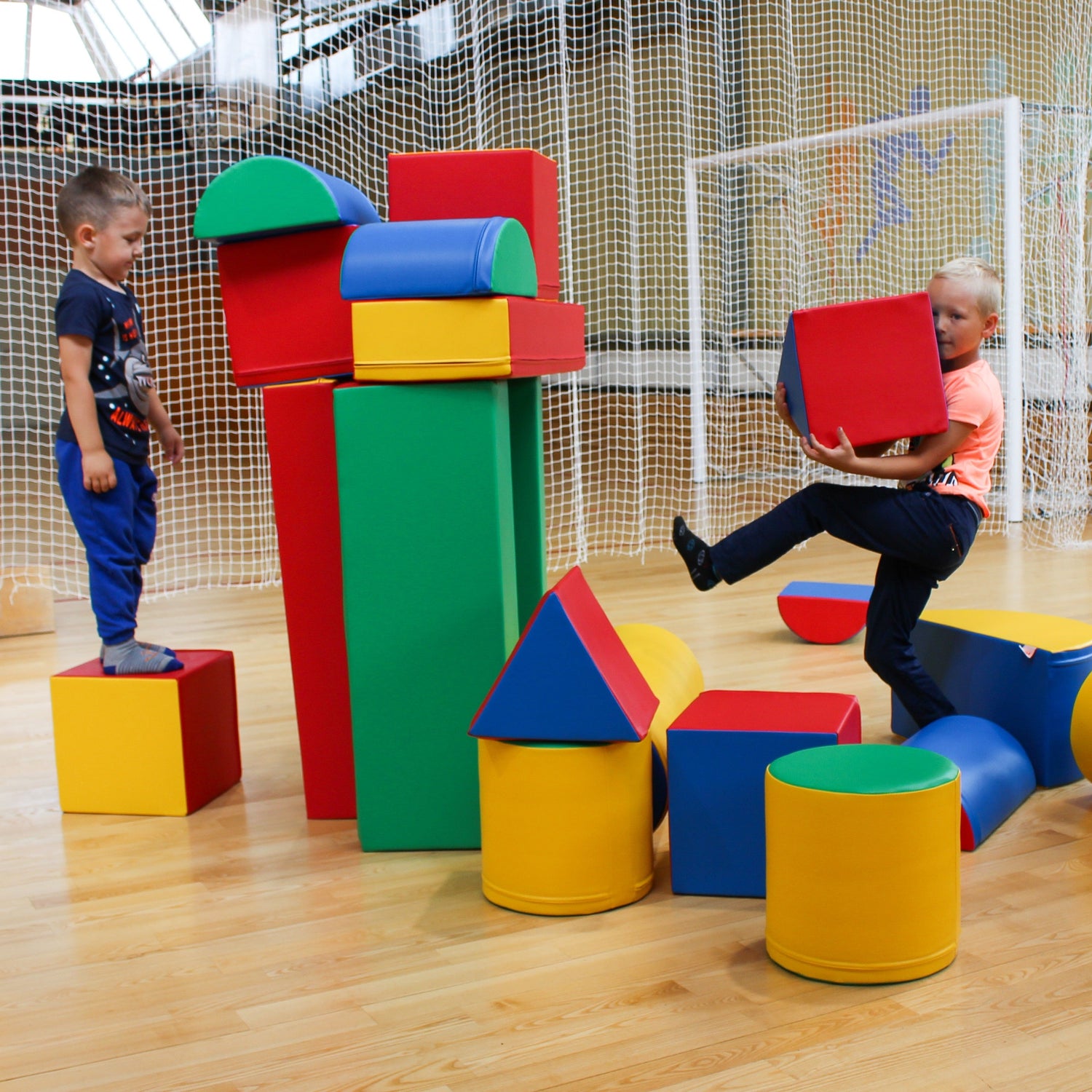 Blush Apricot Mega Fort soft play set with igloo-shaped furniture, colorful cushions, and cozy indoor play area for kids