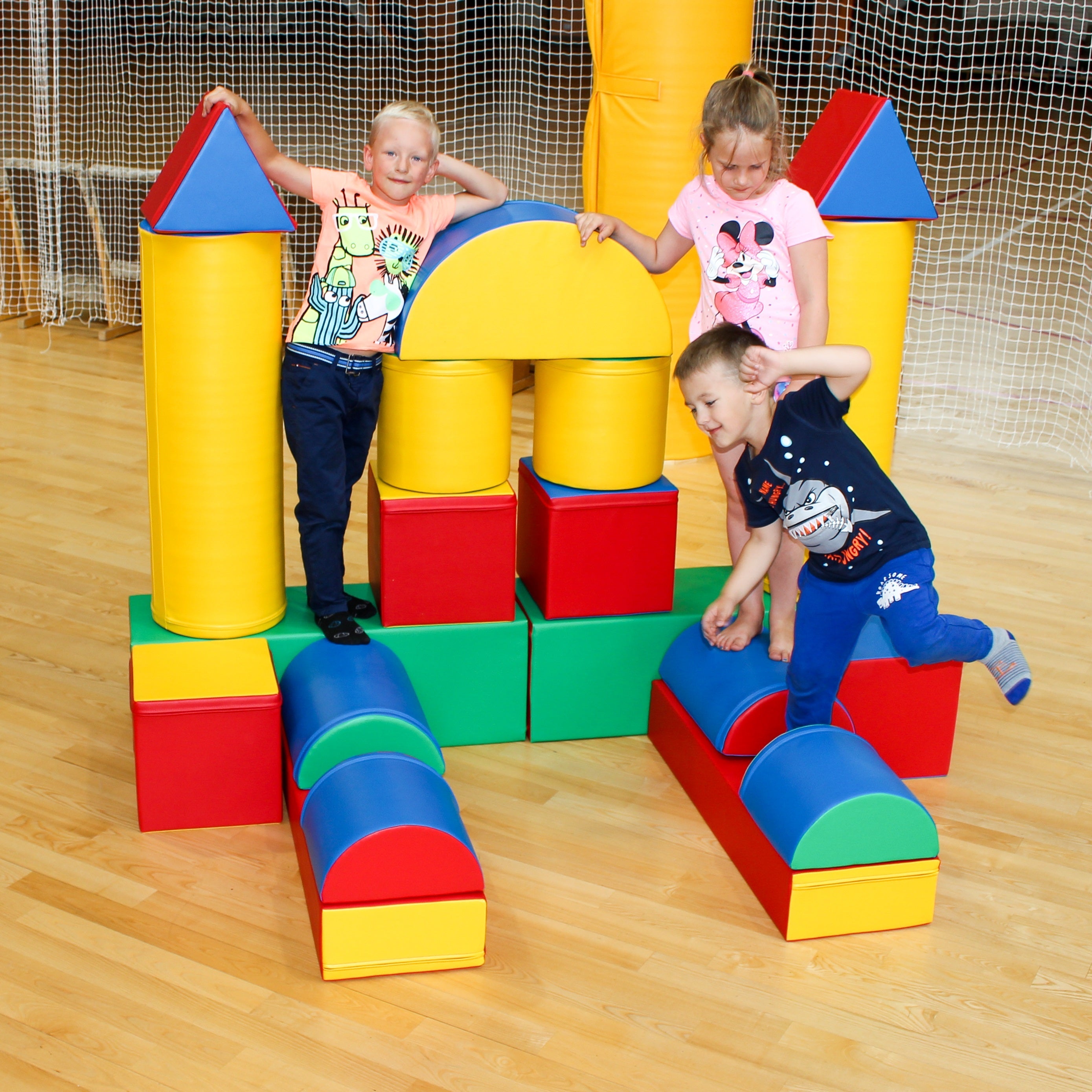 Blush Apricot Mega Fort soft play set resembling an igloo, featuring colorful cushions and fabric panels for kids&