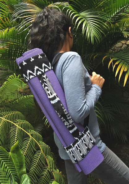 Ariel backstrap yoga mat sling with ikat fabric design, versatile equipment for carrying yoga mats and accessories comfortably.
