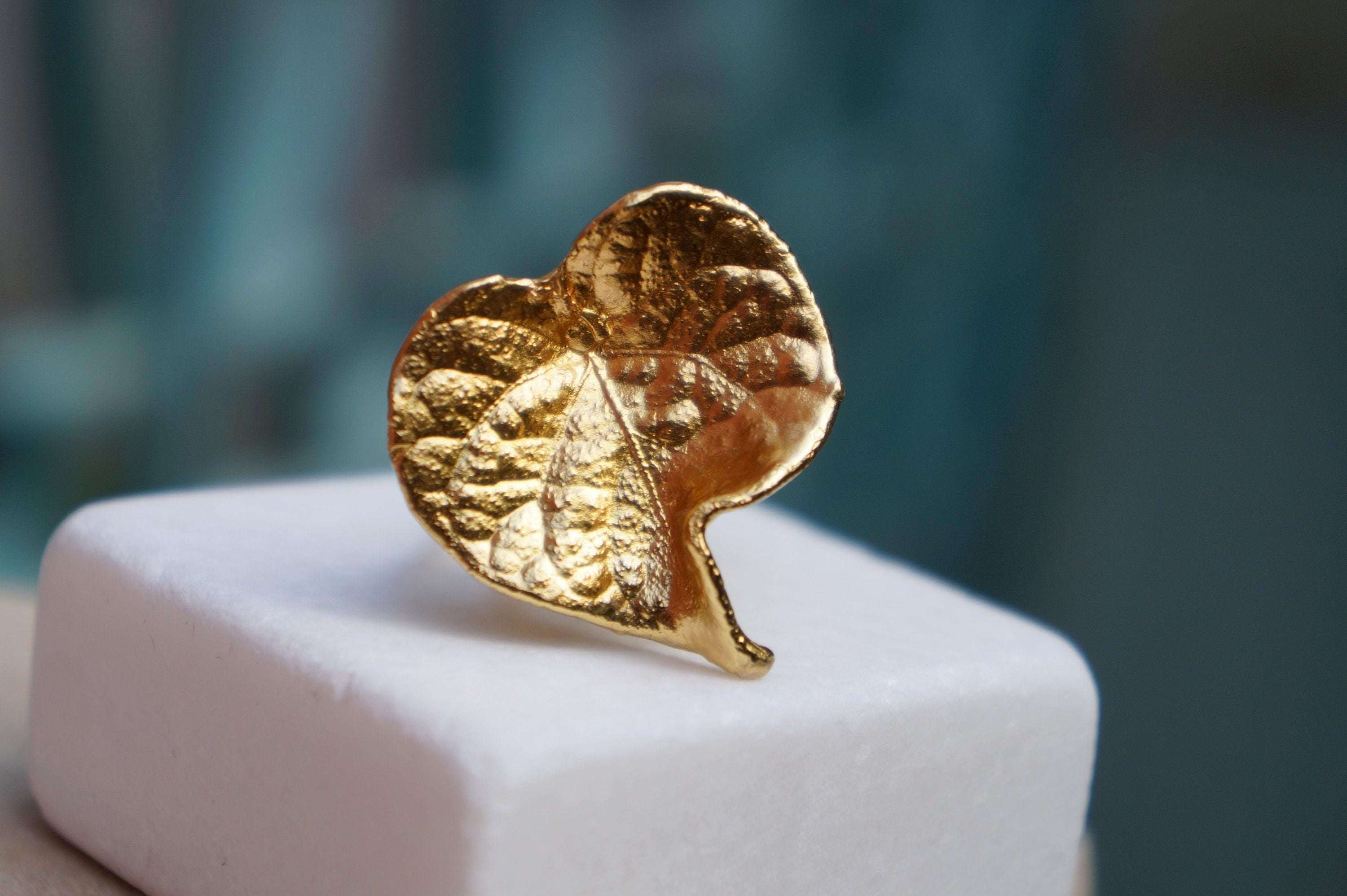 14k gold-plated brass forest leaf ring from Beige Briseis featuring an adjustable plant-inspired design in jewelry and watches.