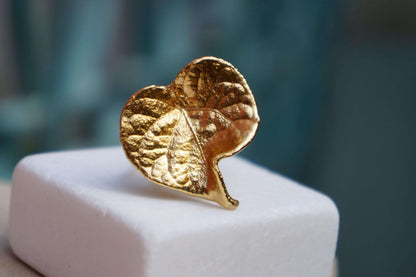 14k gold-plated brass forest leaf ring from Beige Briseis featuring an adjustable plant-inspired design in jewelry and watches.
