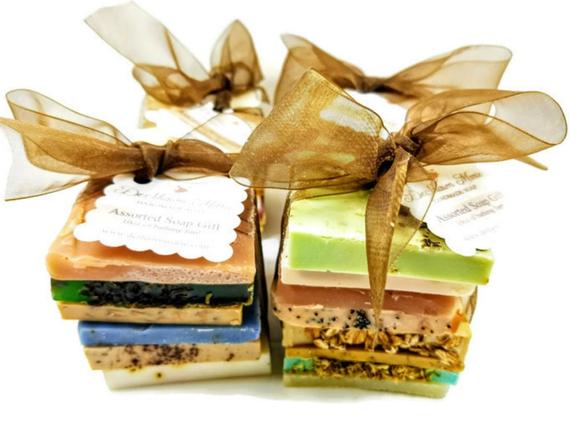 Assorted vegan soap sampler from Yellow Shadow featuring natural bodycare soaps with various scents and textures.