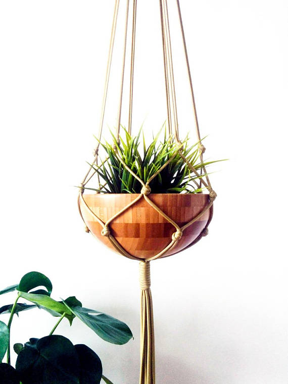 Silver Simba macrame plant hanger with hanging planter, featuring intricate knotted design for home and garden decor.