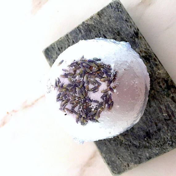 White Smokey Organic Lavender Bath Bomb Calm Bomb in two sizes, relaxing bodycare product with lavender scent for soothing baths.