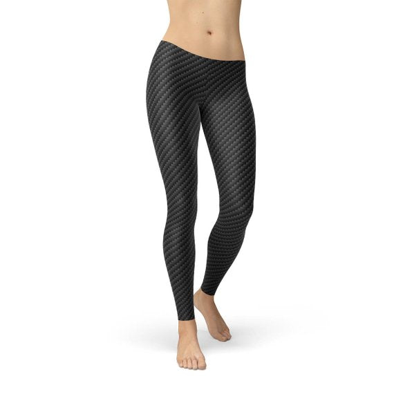 Women’s black carbon fiber leggings by Maroon Sooty, showcasing sleek, high-waisted design with a shiny textured finish.