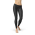 Women’s black carbon fiber leggings by Maroon Sooty, showcasing sleek, high-waisted design with a shiny textured finish.