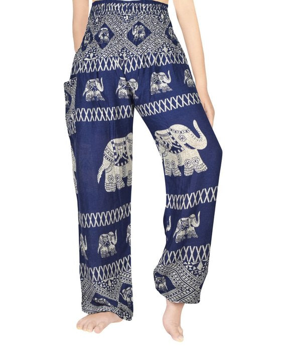 Blue boho elephant print pants for women, Tan Smokey hippie yoga pants with relaxed fit and vibrant, artistic design.