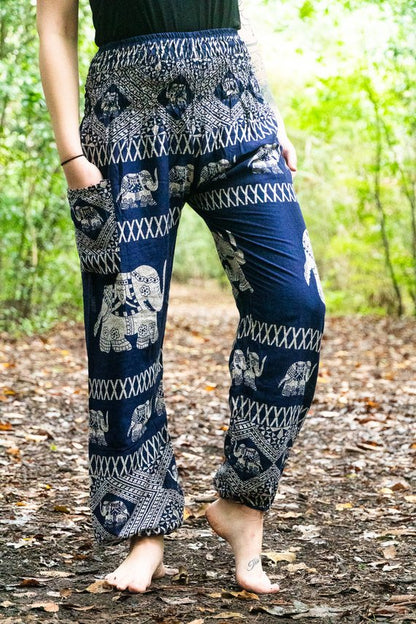 Blue boho elephant print yoga pants for women by Tan Smokey, featuring a relaxed fit and hippie-inspired design.