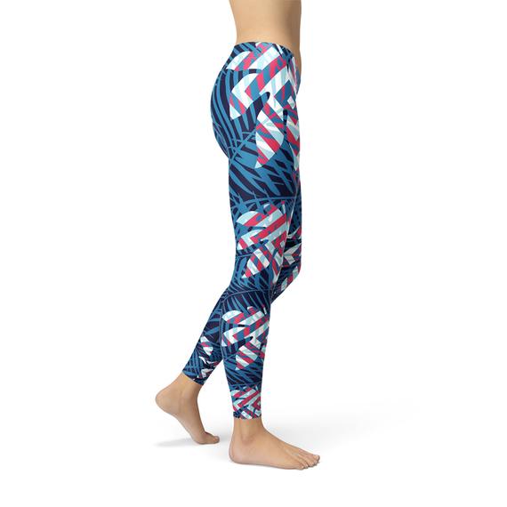 Blue tropical leaf print leggings for women by Maroon Sooty, featuring vibrant tropical foliage design and comfortable fit.