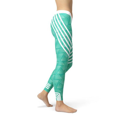 Maroon Sooty turquoise sports leggings with a high waistband and breathable fabric, suitable for workout and athletic activities.