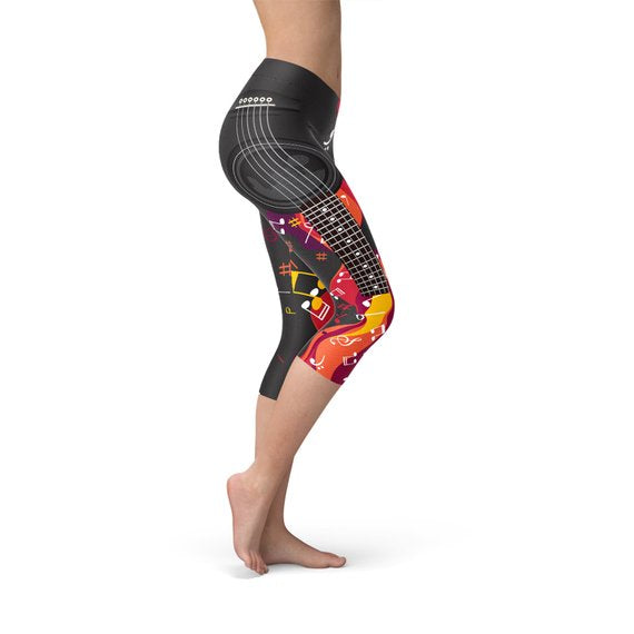Maroon Sooty guitar and music note Capri leggings featuring musical instrument and note patterns on comfortable fabric.