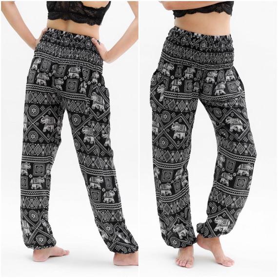 Black elephant print boho pants for women, featuring a relaxed fit and hippie style, perfect for yoga or casual wear.