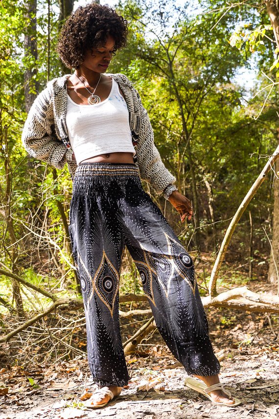 Black PEACOCK women’s boho pants by Tan Smokey, hippie yoga pants with a relaxed fit and bohemian style, shown in the image.