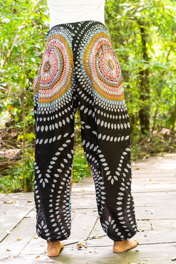 Black Lotus women harem pants by Tan Smokey featuring boho style with loose, comfortable fit and hippie-inspired design.