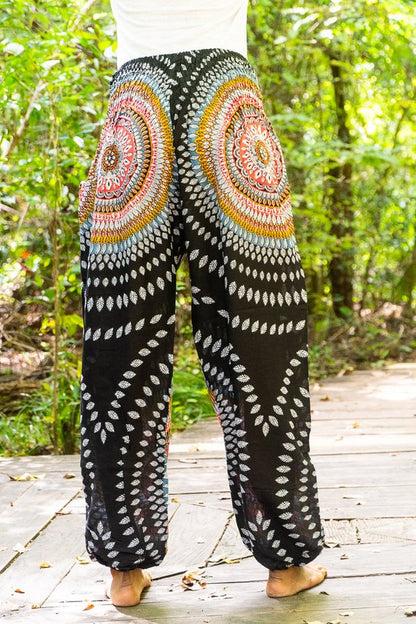 Black Lotus women harem pants by Tan Smokey featuring boho style with loose, comfortable fit and hippie-inspired design.