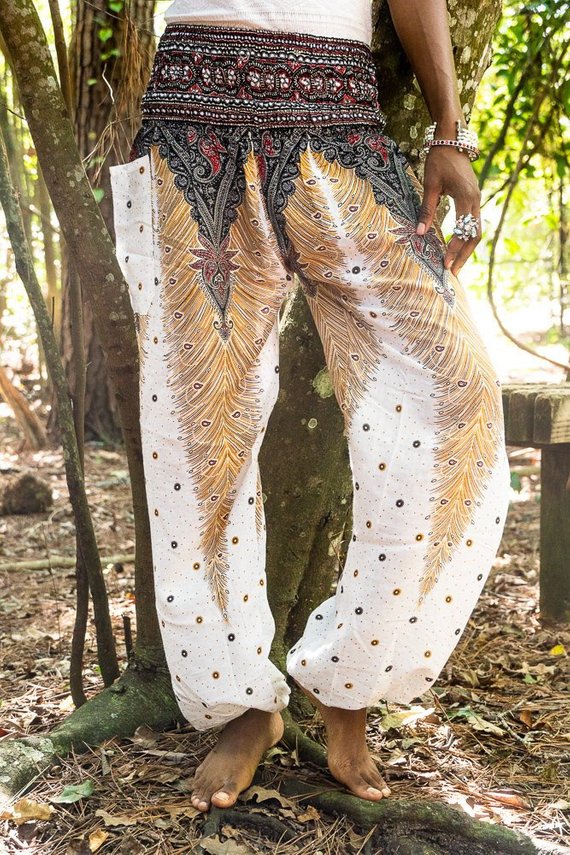 White Peacocks Boho pants by Tan Smokey featuring relaxed fit, hippie style, perfect for yoga and casual wear.