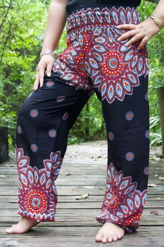 Black floral harem pants for women by Tan Smokey, featuring boho and hippie style with relaxed fit and floral pattern.