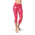 Red Love Hearts Capri Leggings by Maroon Sooty featuring colorful heart patterns and a comfortable stretchy fabric.