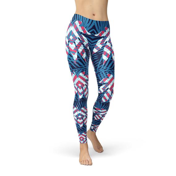 Blue tropical leaf patterned leggings for women by Maroon Sooty, featuring vibrant tropical leaf designs on stretchy fabric