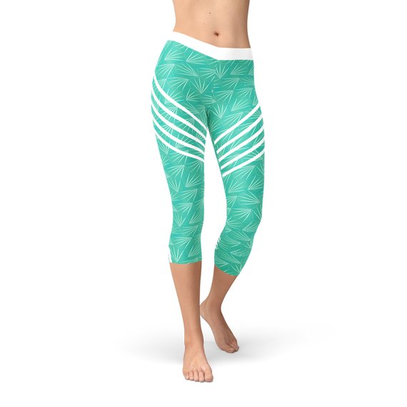 Turquoise Start2Finish sports capri leggings with a fitted design and elastic waistband, ideal for active wear and workouts.