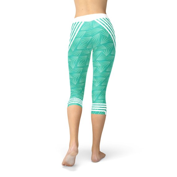 Turquoise Start2Finish sports capri leggings with a comfortable fit and stretchy fabric, ideal for workout and active wear.