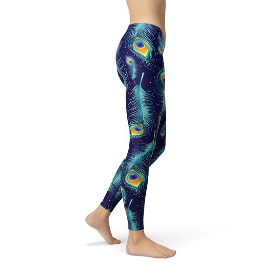 Blue peacock feathers patterned leggings by Maroon Sooty, featuring vibrant feather design and comfortable stretchy fabric.
