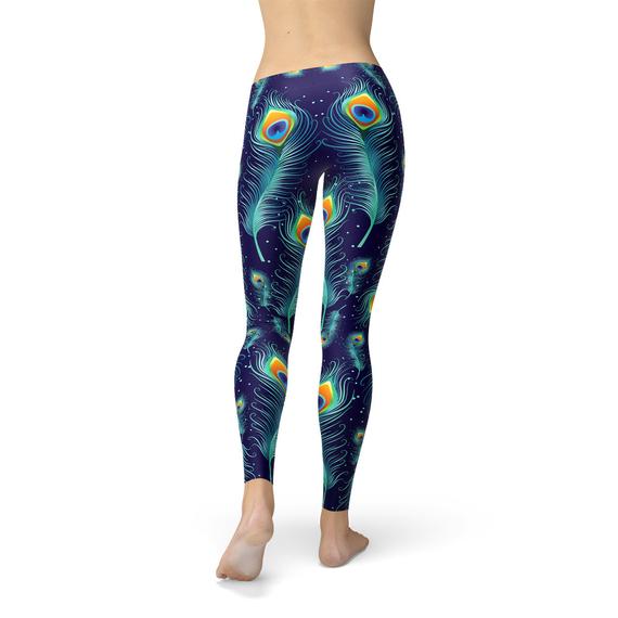 Blue peacock feathers patterned leggings by Maroon Sooty, featuring vibrant feather design and comfortable stretchy fabric.