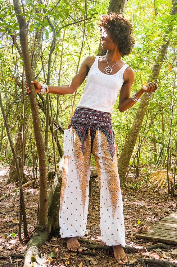 White peacock print boho pants for women by Tan Smokey, featuring relaxed hippie style perfect for yoga or casual wear.