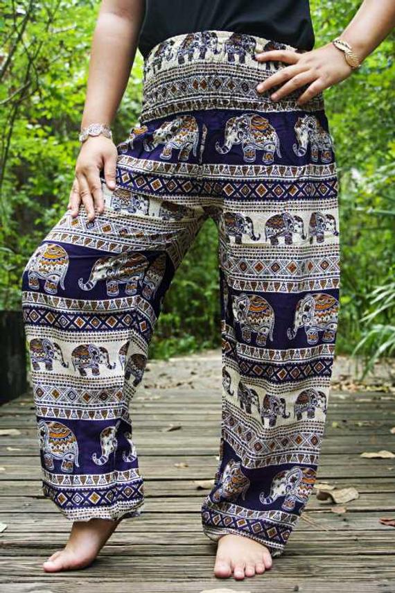 Dark blue Elephant women harem pants by Tan Smokey featuring boho and hippie style with relaxed, flowy fabric and elastic waistband.