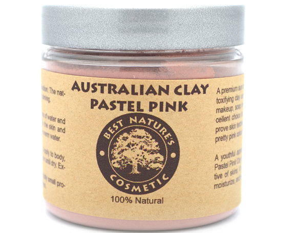 Australian pastel pink clay mask by Yellow Poppy, ideal for stressed, mature skin, shown in a close-up of the skincare product.