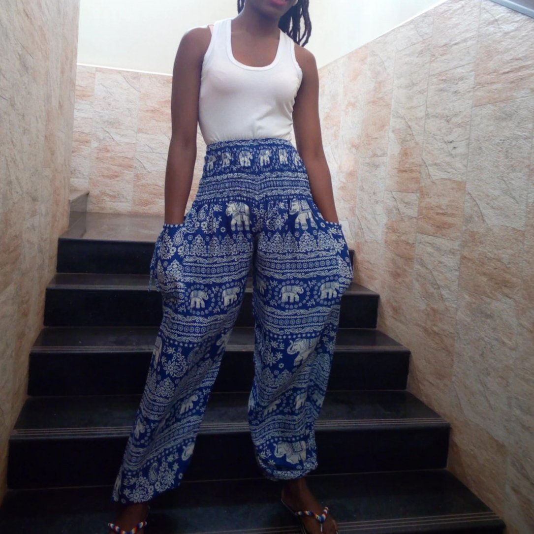 White Baobab high waist animal African print T-shirt featuring vibrant animal patterns and a stylish high waist design.