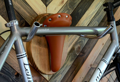 Decorative bike rack featuring a Longhorn steer taxidermy design by Pinwheel, for stylish home and garden use.
