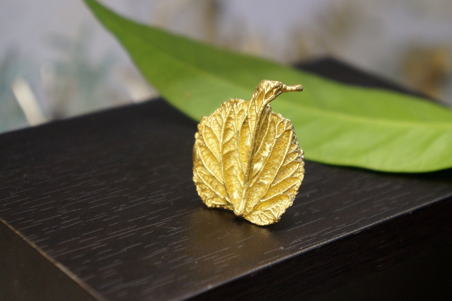 Handmade gold-plated sterling silver leaf ring from Beige Briseis, featuring intricate nature-inspired leaf design.