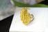 Handmade gold-plated sterling silver leaf ring with intricate leaf design, part of Beige Briseis jewelry collection