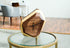Pinwheel geometric wall and table clock as a modern home decor piece with a sleek, stylish design on a neutral background