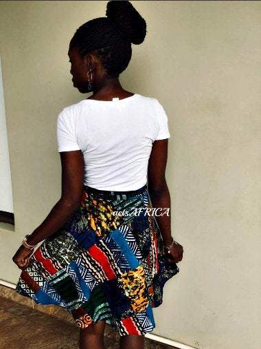 White Baobab vintage batik wrap mini kitenge skirt featuring vibrant African round skirt design and intricate fabric patterns.