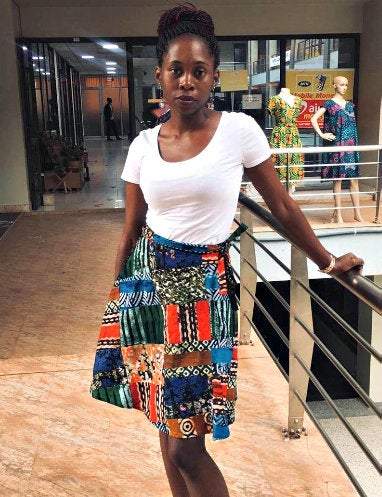 Vintage Batik Wrap Mini Kitenge Skirt by White Baobab featuring traditional African round print, styled as a fashionable T-shirt.