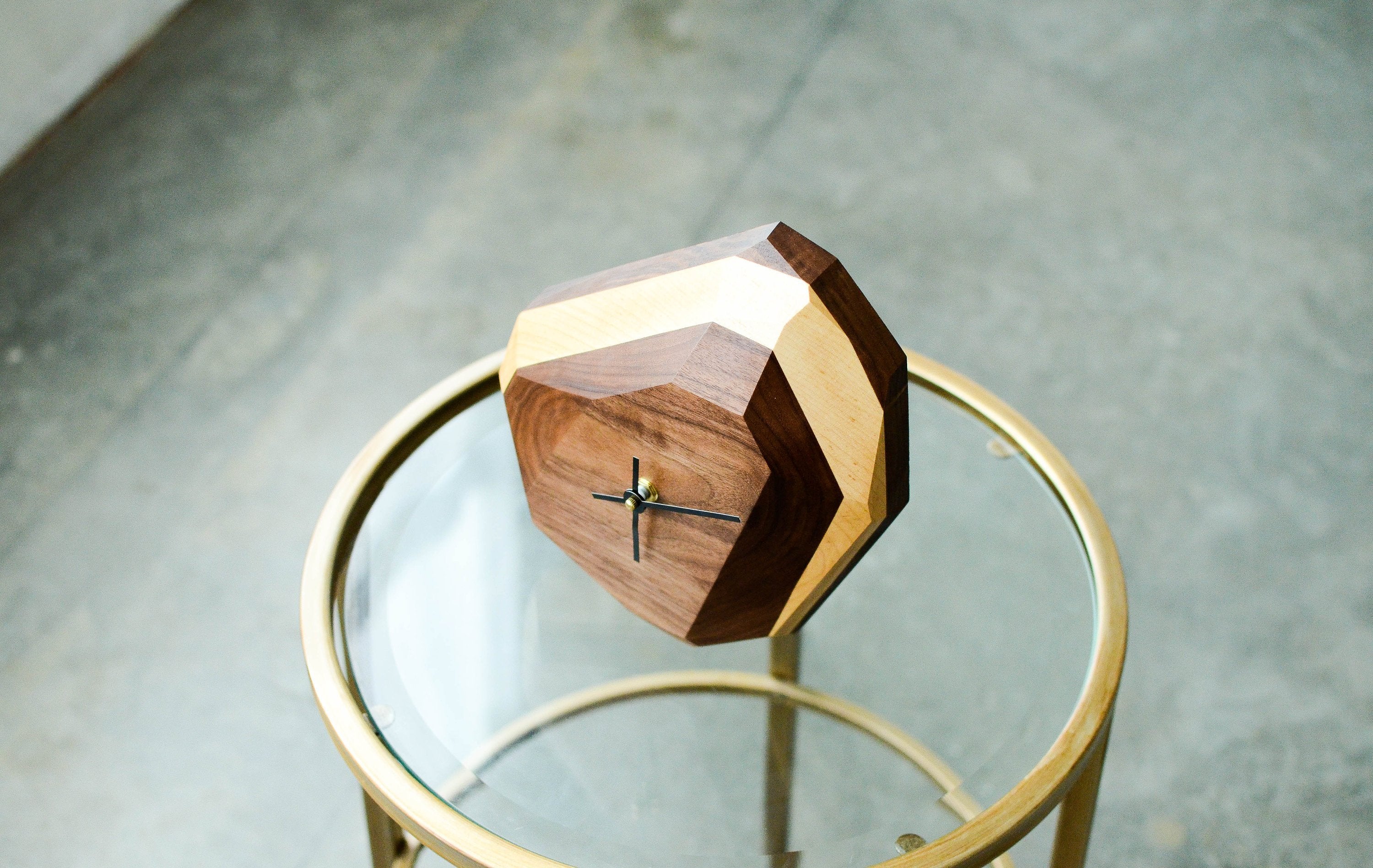 Pinwheel geometric wall and table clock, modern home decor with a stylish geometric design and sleek finish.