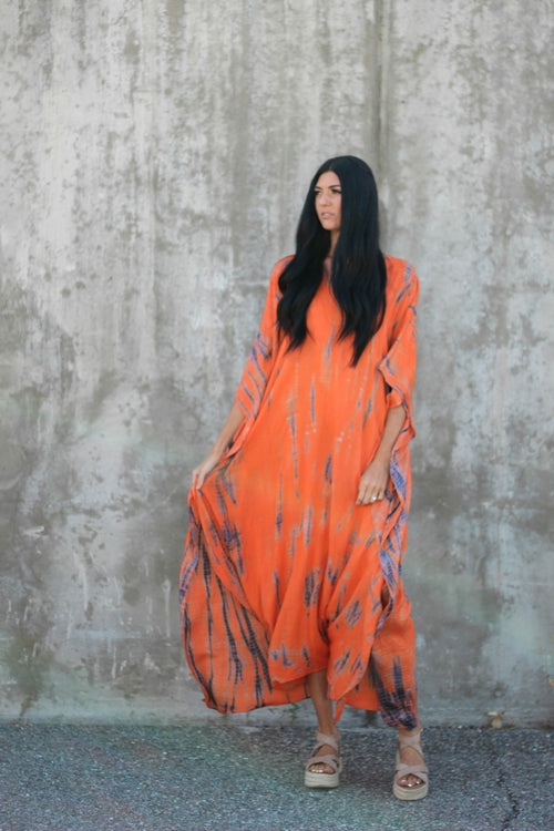 Orange hand-dyed tie-dye maxi kaftan dress with pockets, loose fit, by Erin Pontus, featuring vibrant, flowing fabric and casual style.