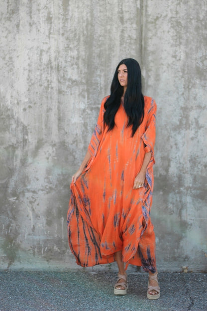 Orange hand-dyed tie-dye maxi kaftan dress with pockets, loose fit, by Erin Pontus, featuring vibrant, flowing fabric and casual style.