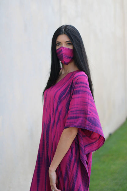 Plus size tie-dyed kaftan dress by Erin Pontus featuring vibrant African and Indian-inspired patterns, flowing and comfortable.