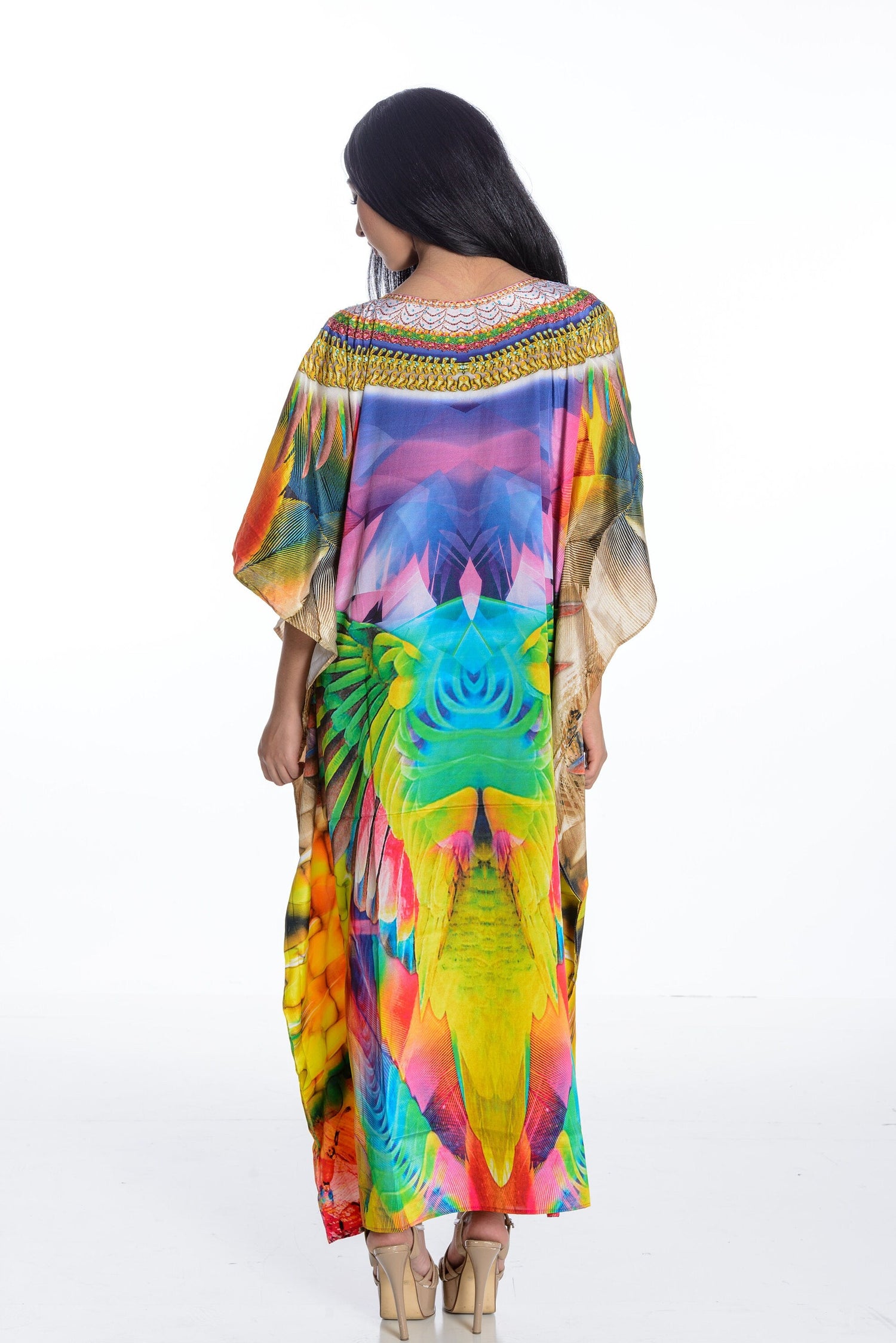 Plus size Mexican maxi kaftan dress by Erin Pontus, flowing fabric with vibrant patterns for women.