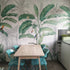 Green Tulsi tropical jungle wallpaper mural featuring lush green leaves and vibrant jungle scenery for home decor.