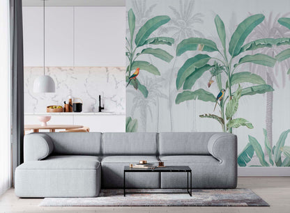 Green Tropical Jungle Wallpaper Mural by Green Tulsi featuring lush green leaves and vibrant jungle scenery for home decor.