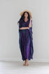Purple tie-dyed maxi kaftan dress by Erin Pontus, flowing abaya style with vibrant patterns and elegant design.