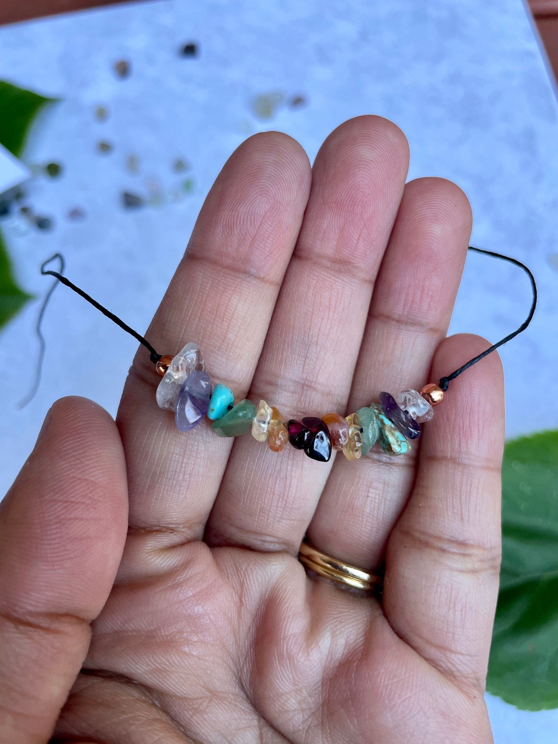 Turquoise Mulberry Chakra Balance crystal bracelet featuring eco-friendly, sustainable design with polished beads and adjustable cord.