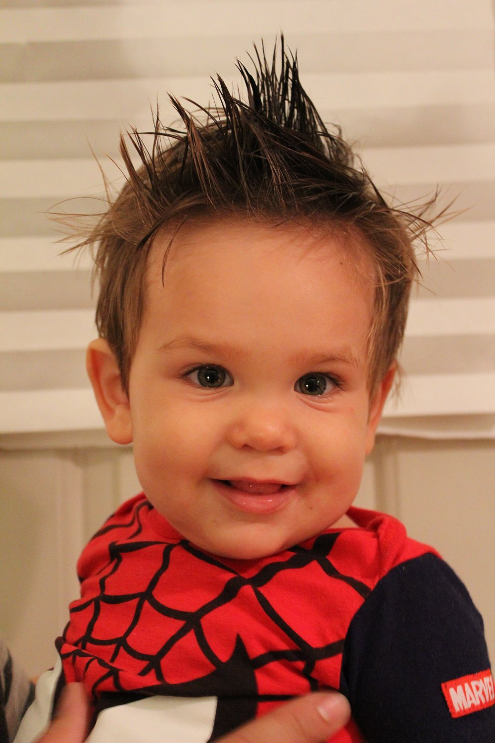 White Smokey organic hair wax for babies, children, and adults, showing the natural textured wax product in a jar.