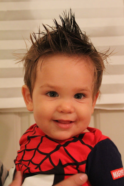 White Smokey organic hair wax for babies, children, and adults, showing the natural textured wax product in a jar.