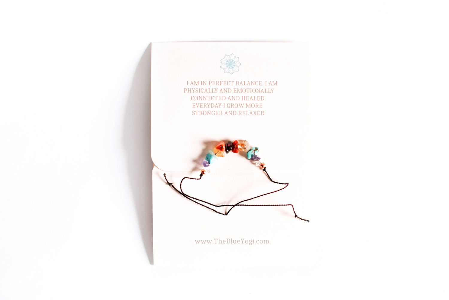 Turquoise Mulberry Chakra Balance crystal bracelet featuring eco-friendly, sustainable design with colorful beads and a silver clasp.